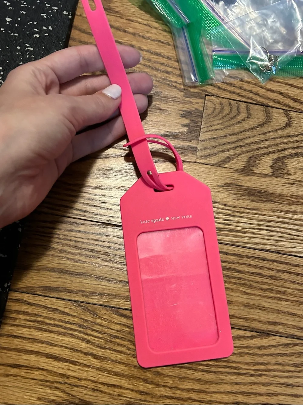 Kate Spade pink and orange luggage tag with flaw